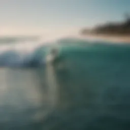 An aerial view of surfers riding waves at a popular beach.