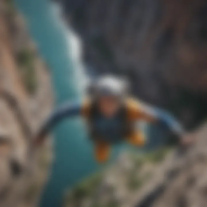 An extreme athlete base jumping off a towering cliff