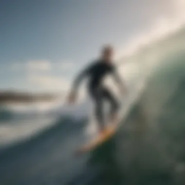 Aerial view of a surfer catching a wave with a 7ft surfboard