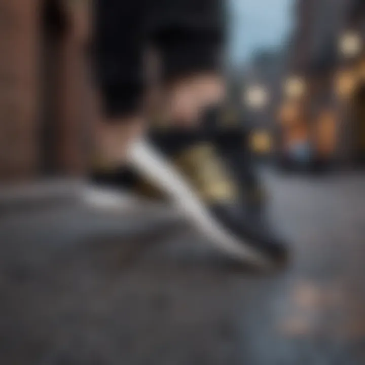 Black and Gold Adidas Sneakers Against Urban Street Background