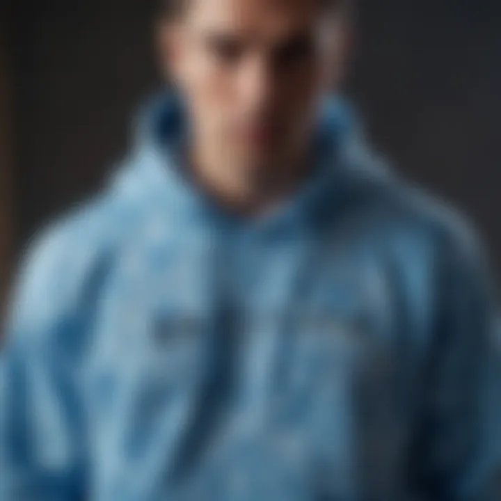 Blue tie dye hoodie in action-packed extreme sports setting