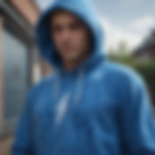 Vibrant blue tie dye hoodie with lightning bolt design