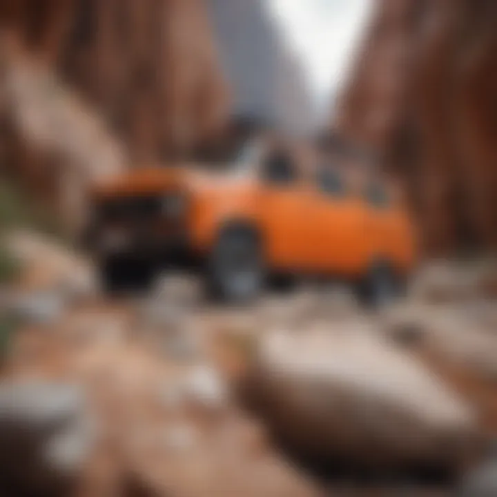 Bright orange van amidst rocky terrain with rock climbing gear