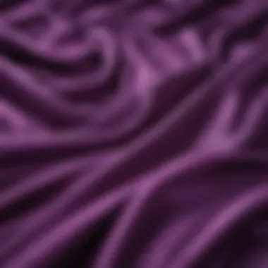 Elegant silk fabric draping in rich purple hue