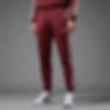 Chic Adidas Burgundy Sweatpants styled for a sophisticated look