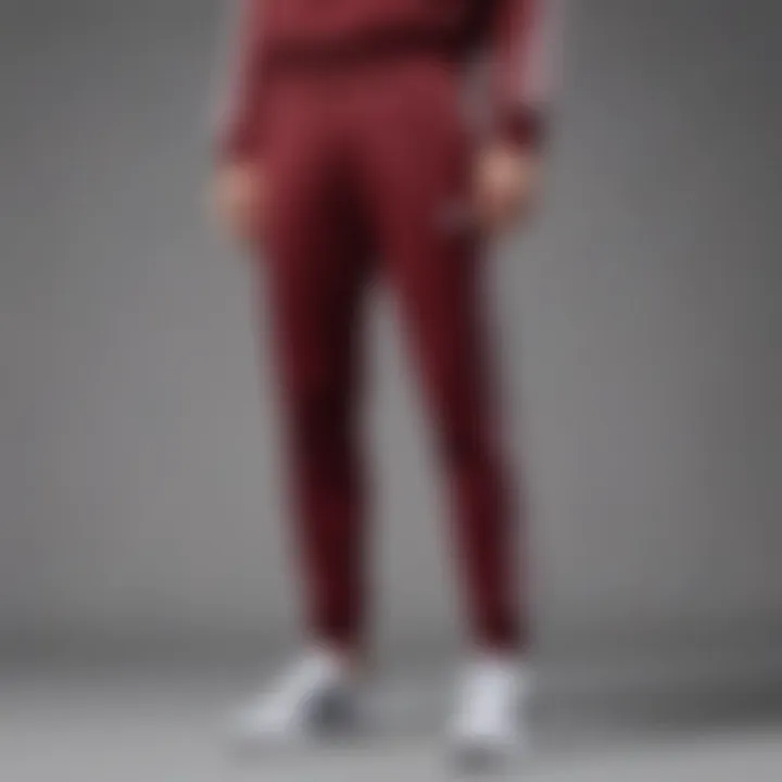 Chic Adidas Burgundy Sweatpants styled for a sophisticated look