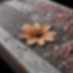 Close-up view of the Burton Blossom snowboard showcasing its intricate design patterns.