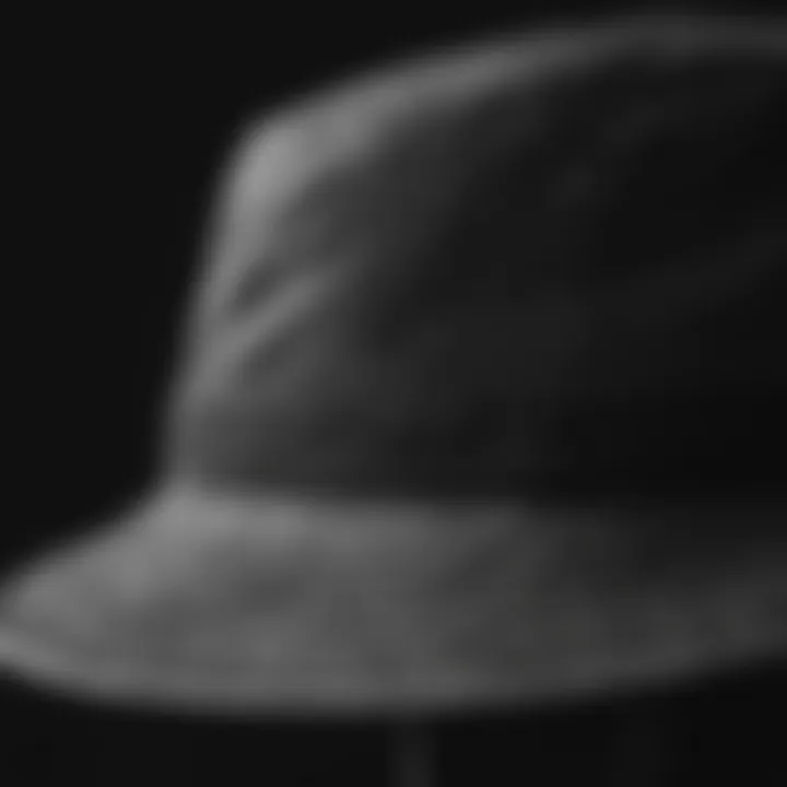 Close-up of detailed stitching on black and white bucket hat