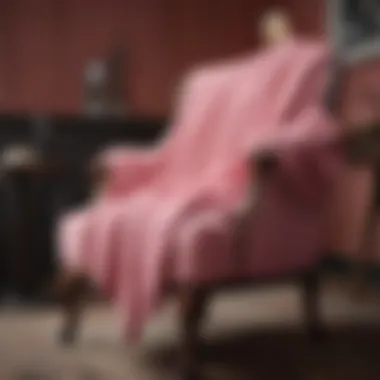 Draped Elegance Luxurious Pink Chenille Sweater draped over chair