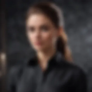 Elegantly draped black button-up shirt on marble backdrop