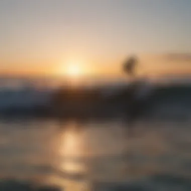 Sunset silhouettes of surfers riding the waves