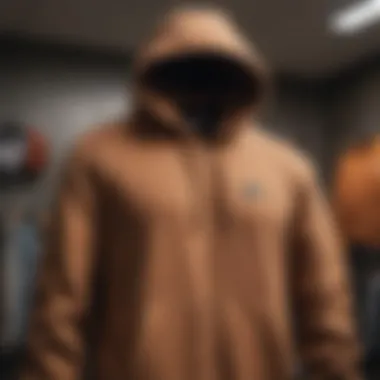 Nike Brown Hoodie displayed on a hanger in a modern closet.