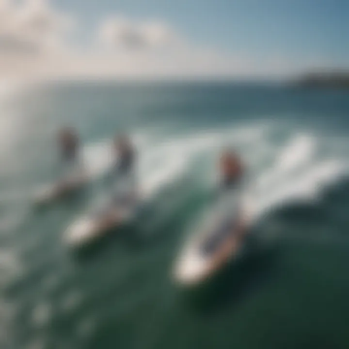 An aerial view of a group of electric hydrofoil surfers enjoying the waves