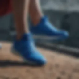 Dynamic athlete showcasing blue Adidas footwear in an extreme sports setting