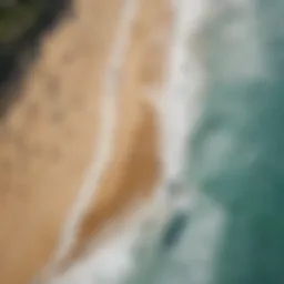 Aerial view of iconic surfing waves at Waikiki Beach