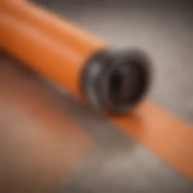 Close-Up of Orange Grip Tape A close-up view of vibrant orange grip tape on a skateboard deck