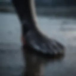 A close-up of a wetsuit foot showcasing the material and fit
