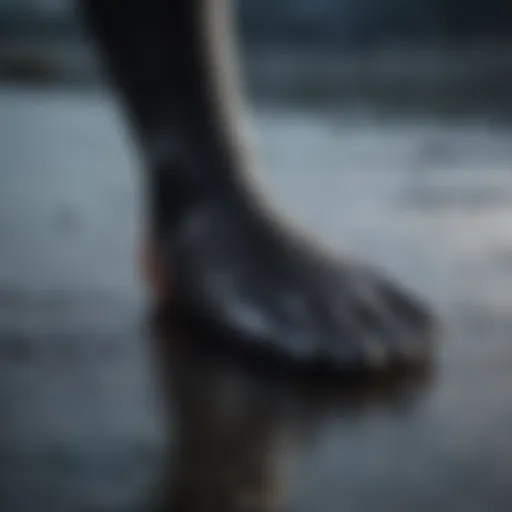 A close-up of a wetsuit foot showcasing the material and fit