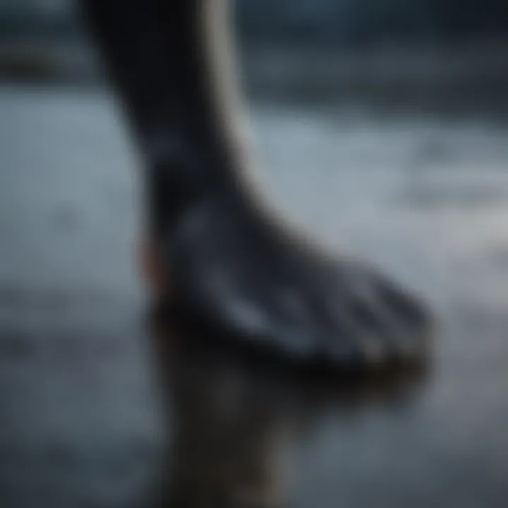 A close-up of a wetsuit foot showcasing the material and fit