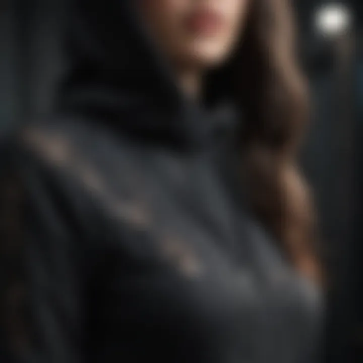 Intricate Lace Detailing on Black Hoodie Elegant black hoodie with intricate lace detailing