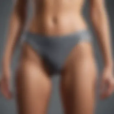 Fashion-forward grey bikini bottoms with unique asymmetrical design