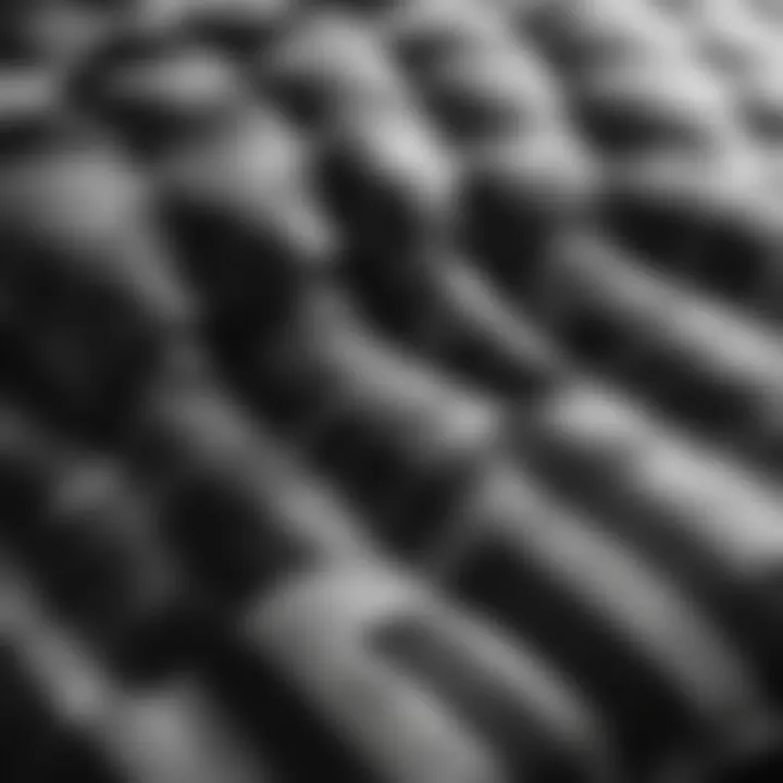 Close-up of intricate black and white checkered pillow design