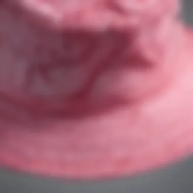 Close-up of intricate pink tie-dye bucket hat pattern