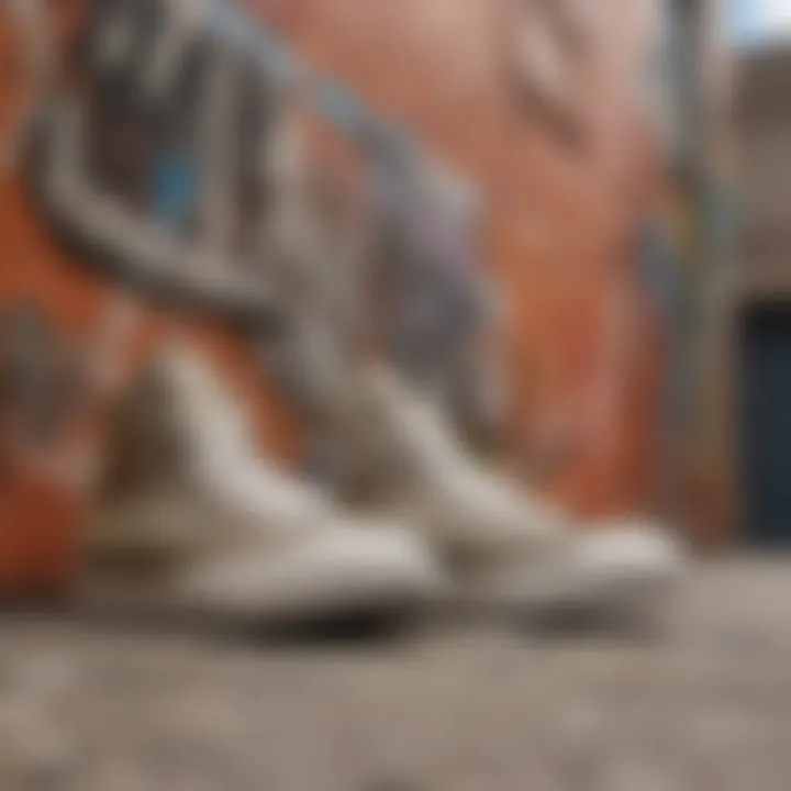 Pair of Khaki Chuck Taylors against Artistic Graffiti Wall