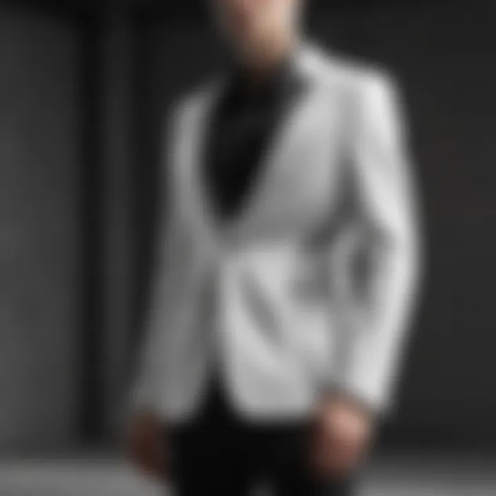 Minimalist black and white low blazer with geometric accents
