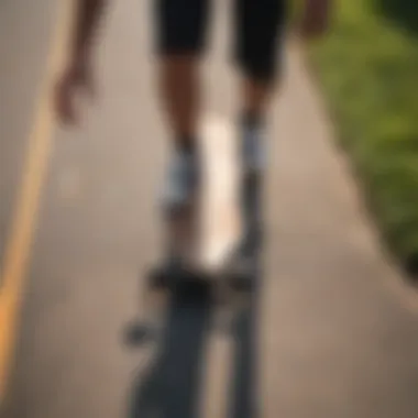 An overhead view of a beginner practicing balance on a longboard in a calm park setting.