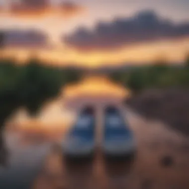 Dramatic sunset over a serene lake with navy Vans slip-ons placed artistically