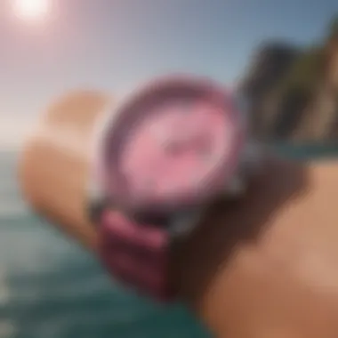 Stylish wrist shot of pink shark watch against ocean backdrop