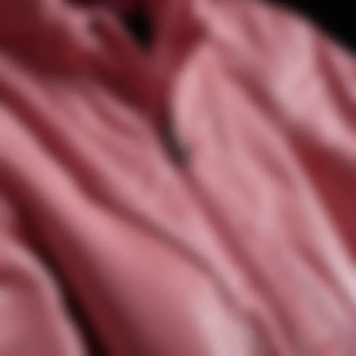 Close-up of a pink windbreaker jacket with intricate stitching details