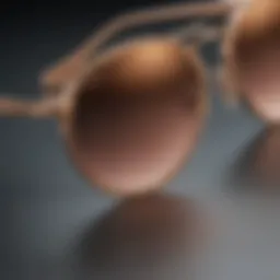 Close-up view of Ray-Ban Round Rose Gold Sunglasses showcasing intricate detailing.