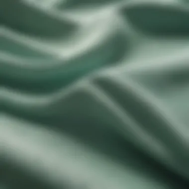 Close-up of Seafoam Green T-Shirt texture with sunlight filtering through fabric