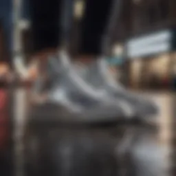 Reflective silver Converse shoes shining under city lights