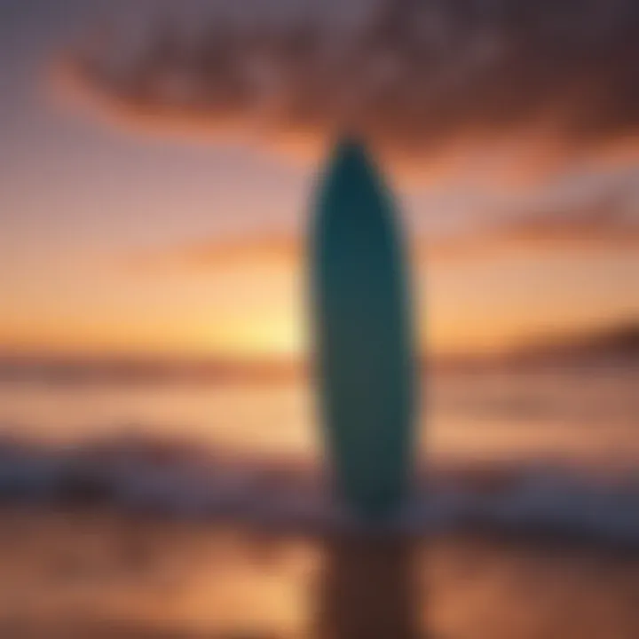 Soft top surfboard against a vibrant sunset backdrop