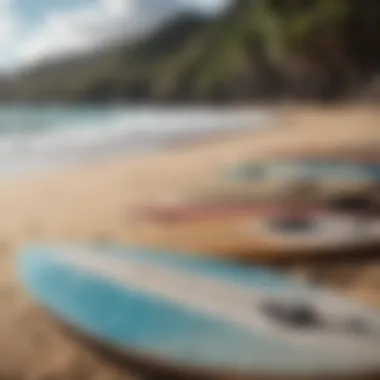 Ready for the Waves: Surfboards Await Surfboards resting on the sand, ready for an adventure