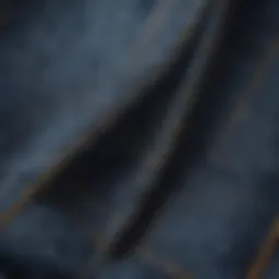 A close-up view highlighting the unique stitching and fabric texture of tapered denim.