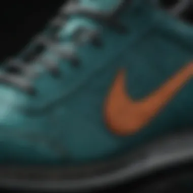 Craftsmanship Revealed: Close-Up of Teal Nike Shoe with Intricate Stitching Teal Nike Shoe Close-Up with Intricate Stitching