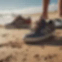 Close-up of high-quality surfing shoes on a sandy beach