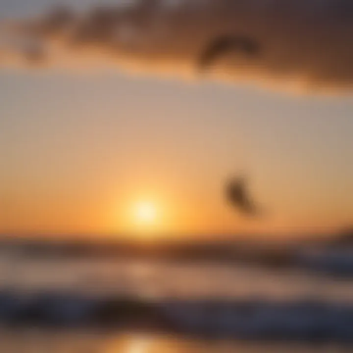 A serene sunset scene with kiteboarders silhouetted against the horizon