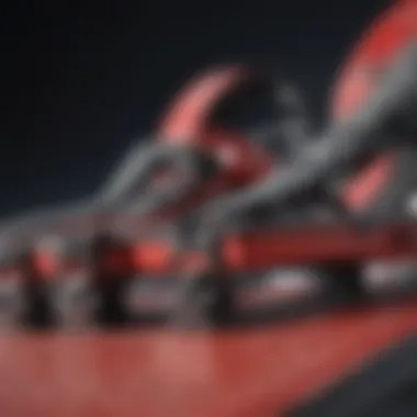Detailed View of Red Snowboard Bindings Close-up of red snowboard bindings showcasing intricate design