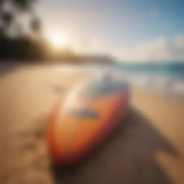 Surfboard with Hawaiian tropical design on a sandy beach