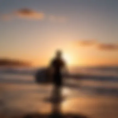 Silhouette of Surfer at Sunset