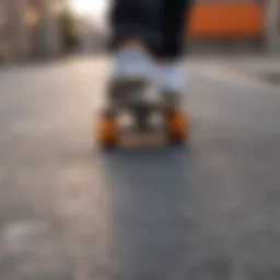 Close-up of skateboard on a concrete surface showcasing skate shoe grip