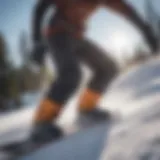 Detailed view of a snowboarder's knee mechanics during a jump