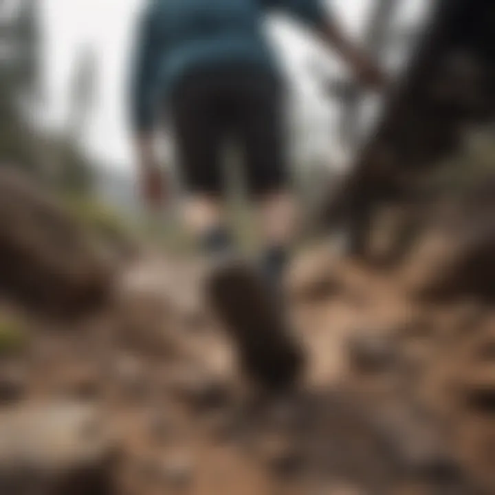 Mountain biker navigating a rocky terrain in Vans Slip-Ons